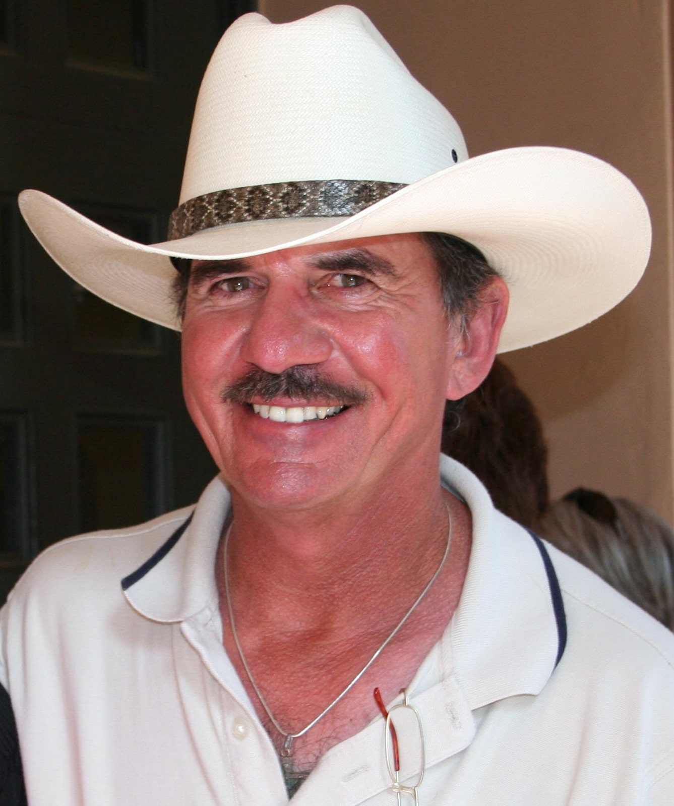 Portrait of George Santos wearing a hat